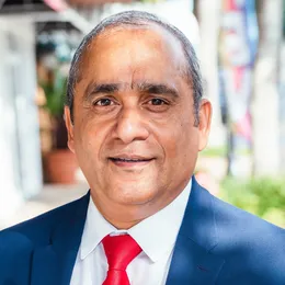 Portrait of Rogy Verghese, Founder and CEO of Insurance Warehouses Franchise, Inc.